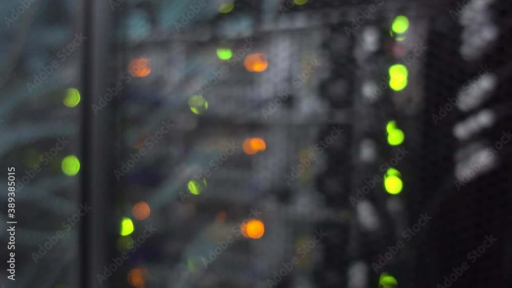 Beautiful bokeh. Server rack with flashing lights. Video contains noise