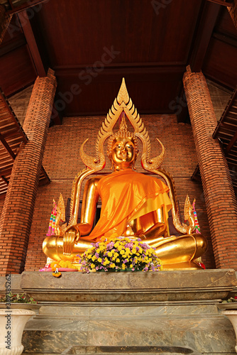 Stunning Golden Buddha Statue in Yellow Robe at the Ordination Hall of Wat Yai Chai Mongkhon Temple, Ayutthaya Historical Park, Thailand