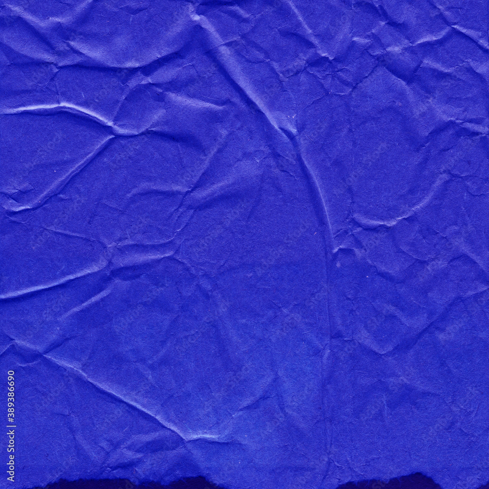 Obraz premium Blue and violet torn paper collage close-up. Texture made from various paper and cardboard parts. Damaged old paper background. Vintage blank wallpaper. Material design backdrop.