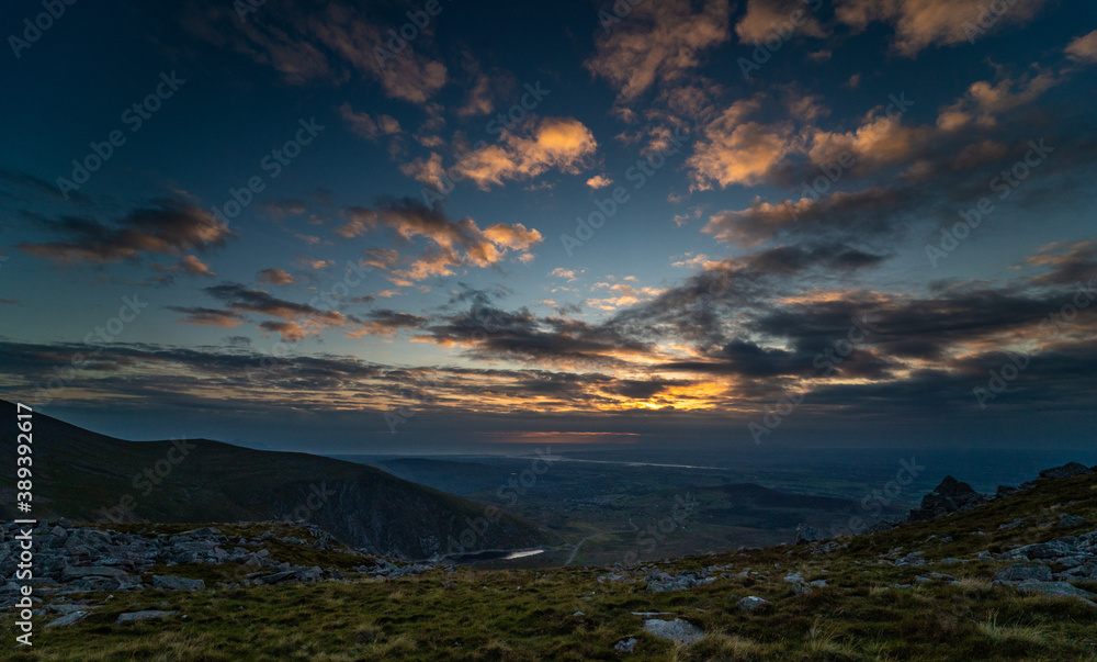 Fototapeta premium Sunset over North Coast of Wales from mountains in Snowdonia National Park