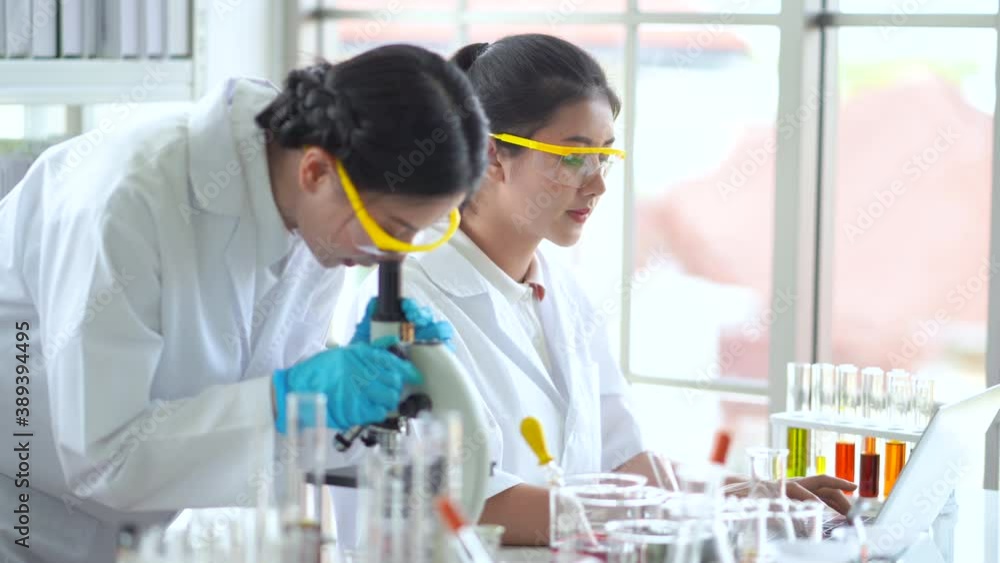 Scientist team working in the laboratory. Working in the laboratory with pleasure.
Scientist team working in the laboratory. Working in the laboratory with pleasure.