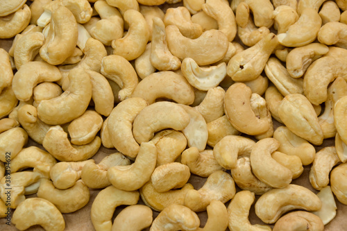 Cashew nuts. Cashew kernels. Clean organic nuts retro background. Organic healthy food.