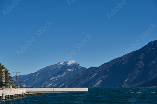 White stone pier on the background of the mountain