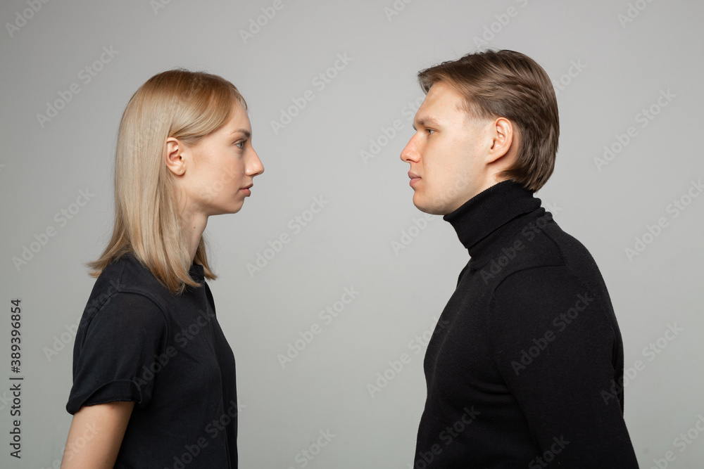 young beautiful couple man and woman in a quarrel young beautiful couple man and woman in a quarrel