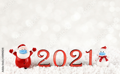 Santa Claus, snowman with b...