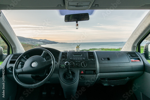 Van interior panel, wheel and the horizon © Aritz Tabuyo