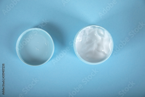 face cream on the blue table