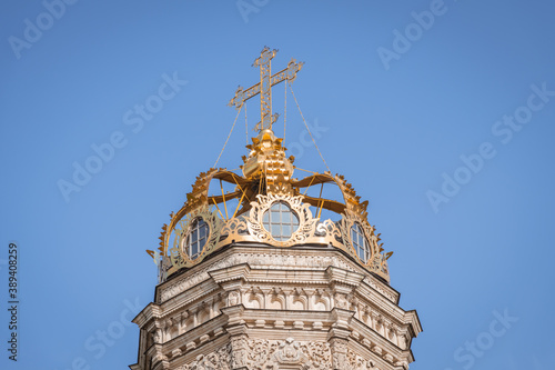 View of the top of the Church of the Sign of the Blessed Virgin Mary in Dubrovitsy on an autumn day against blue sky. Religion theme.