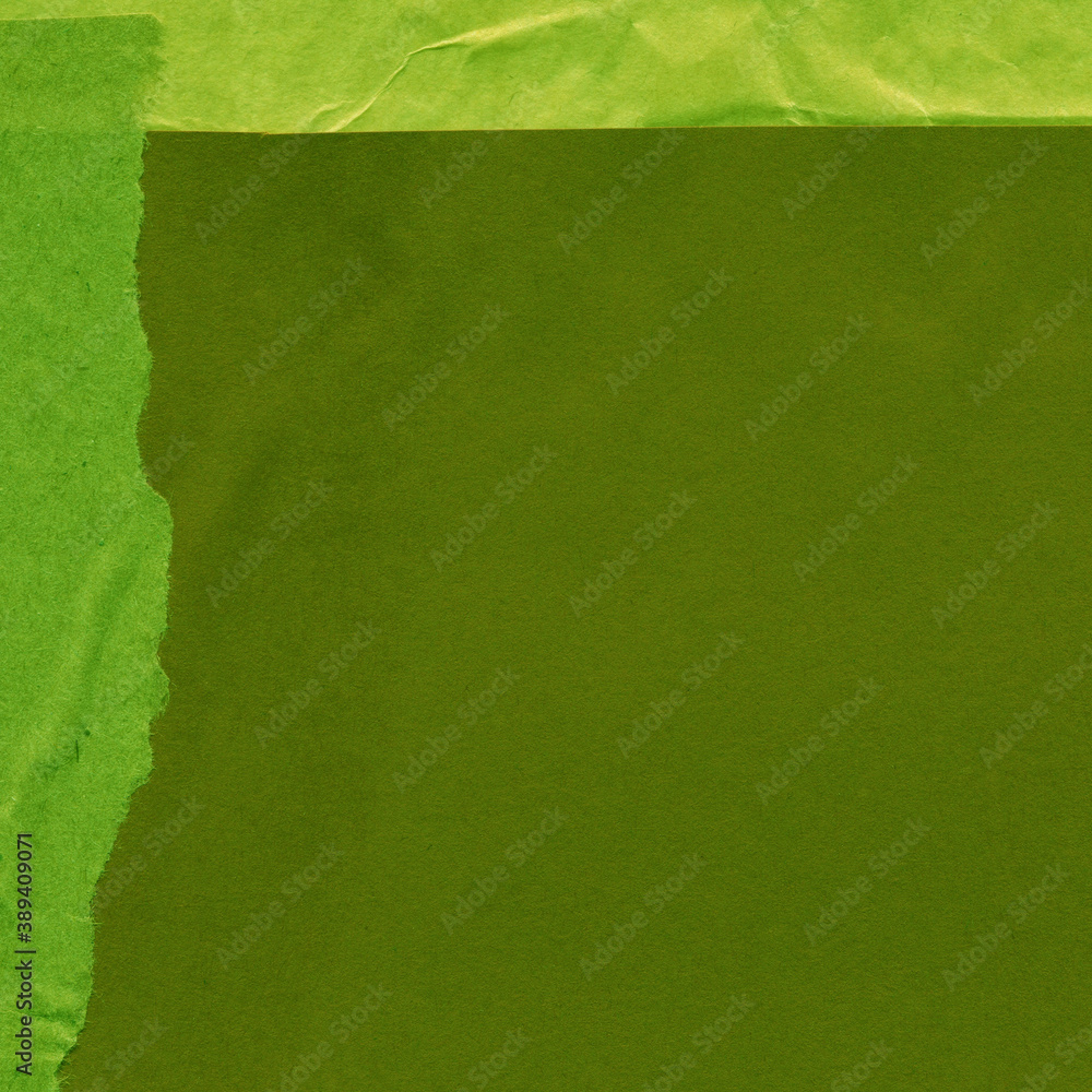 Green torn paper collage close-up. Texture made from various paper and cardboard parts. Damaged old paper background. Vintage blank wallpaper. Material design backdrop. Green torn paper collage close-up. Texture made from various paper and cardboard parts. Damaged old paper background. Vintage blank wallpaper. Material design backdrop.