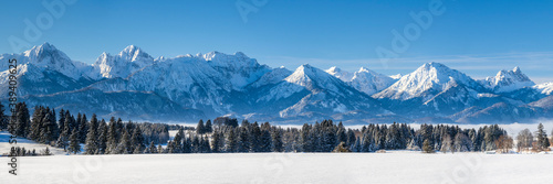 panoramic landscape at winter with alps mountains in Bavaria photo
