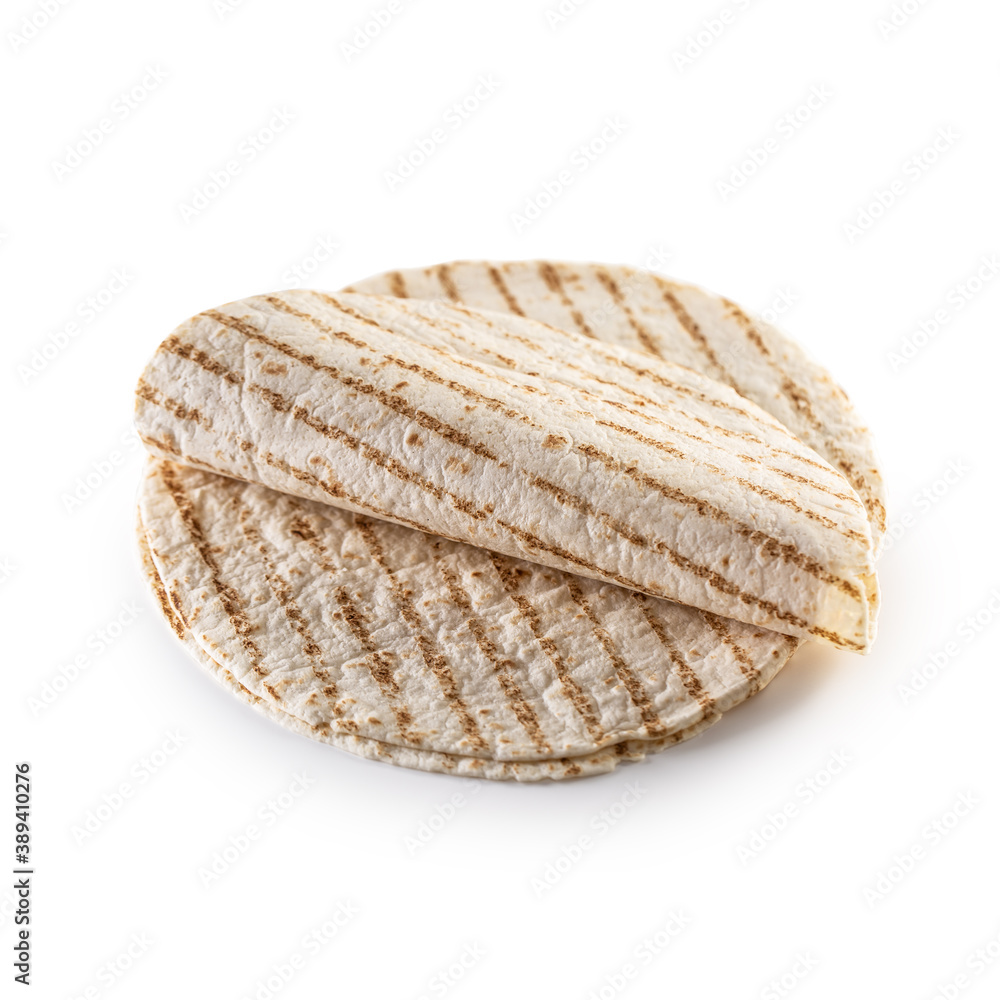 Grilled plain tortilla bread on an isolated white background
