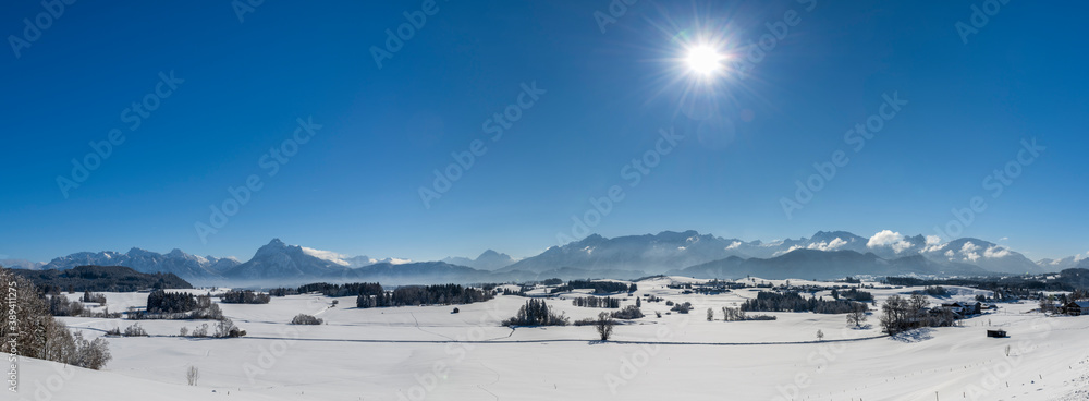 panoramic landscape at winter with alps mountains in Bavaria