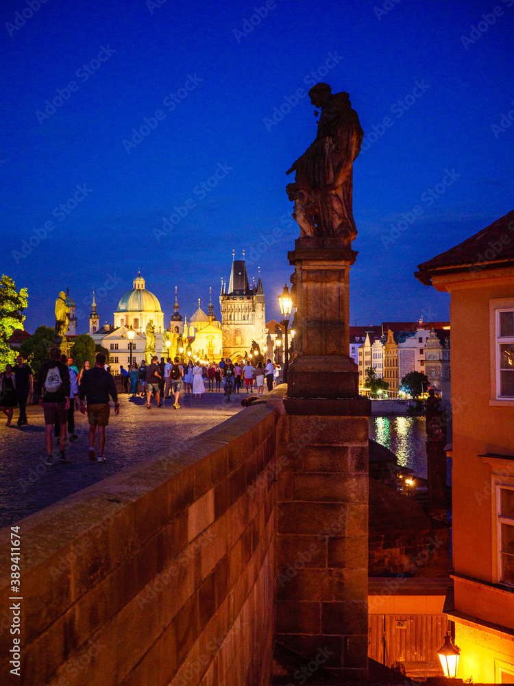 Statue on the Charles Bridge in Prague after the sunset