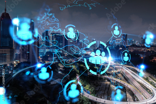 Photography Glowing Social media icons on night panoramic city view of Kuala Lumpur, Malaysia, Asia