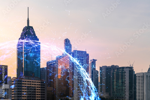 Canvas Print Hologram of abstract technology glowing icons, panoramic cityscape of Kuala Lumpur at sunset, Malaysia, Asia