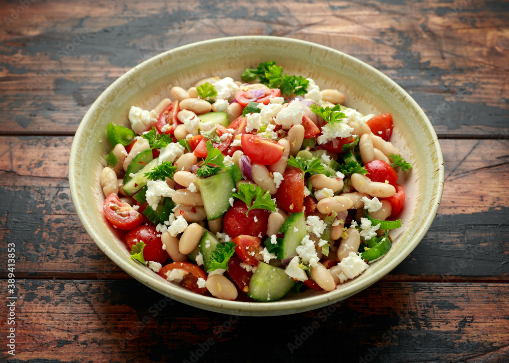 Bean Salad with Cherry Tomatoes, Cucumber, Red onion, Feta cheese and parsley. Healthy vegetarian, vegan diet food Bean Salad with Cherry Tomatoes, Cucumber, Red onion, Feta cheese and parsley. Healthy vegetarian, vegan diet food