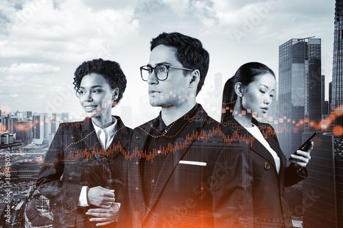 Group of business colleagues working on new venture capital and hi-tech start up and try to forecast risks and estimate prospective earning growth. Hologram chart on Singapore background.