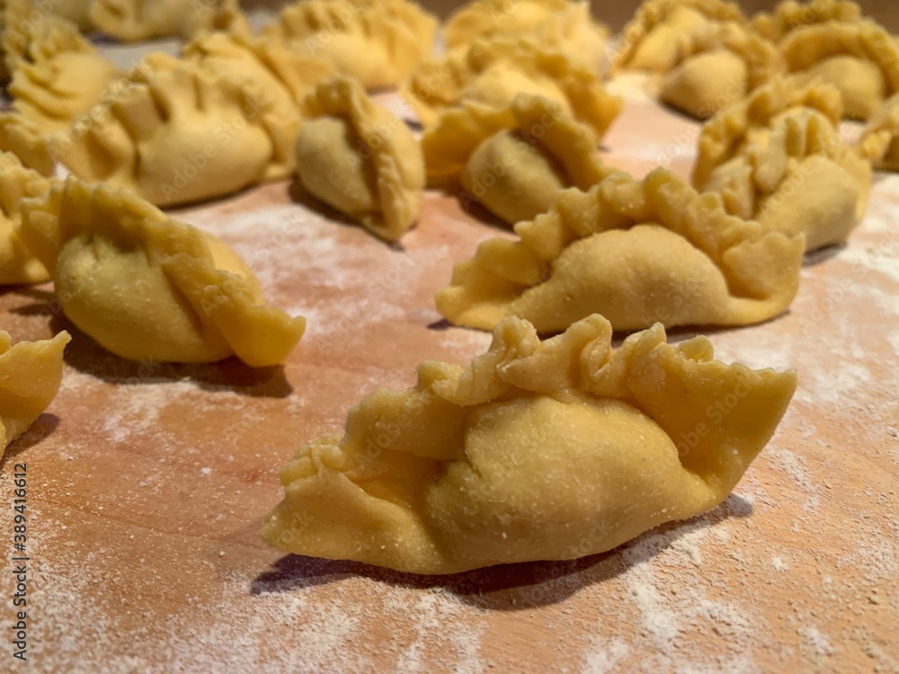 fresh homemade ravioli dumplings with semolina flour