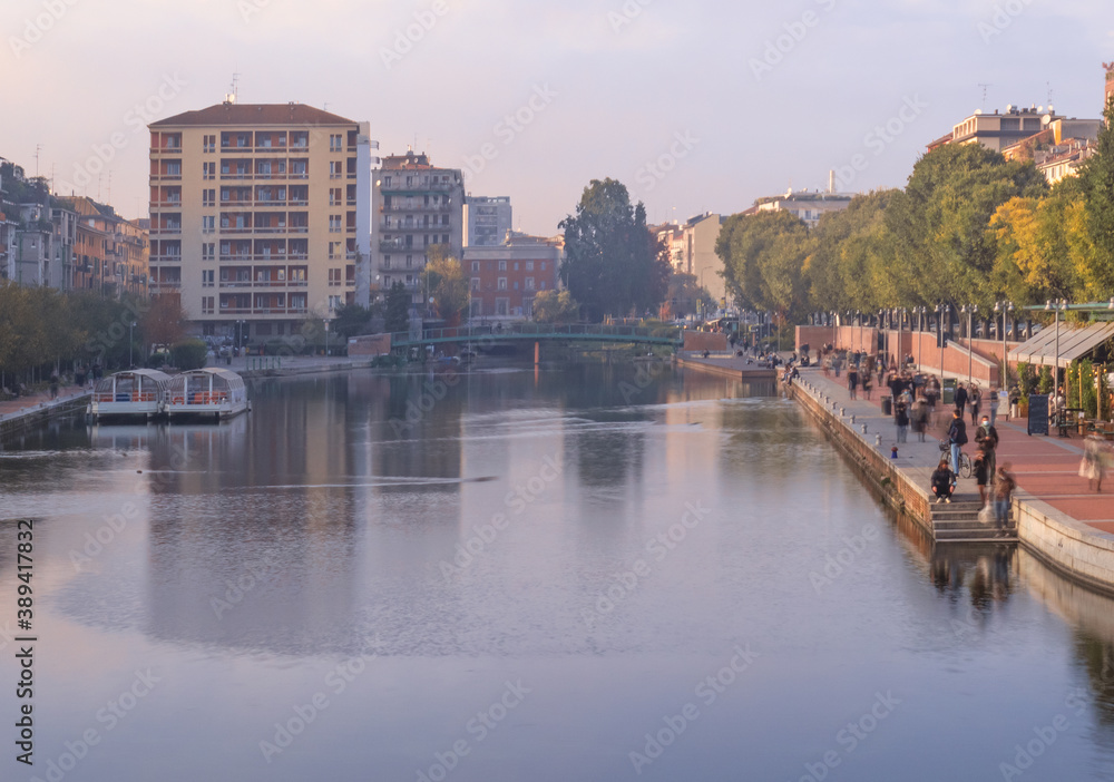 Lazy autumn afternoon in Darsena, the tourist district of Navigli, Milan, Lombardy, Italy