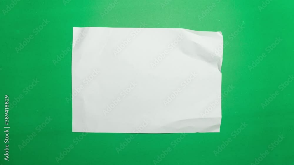 Stop motion animation paper wrinkles making a paper ball