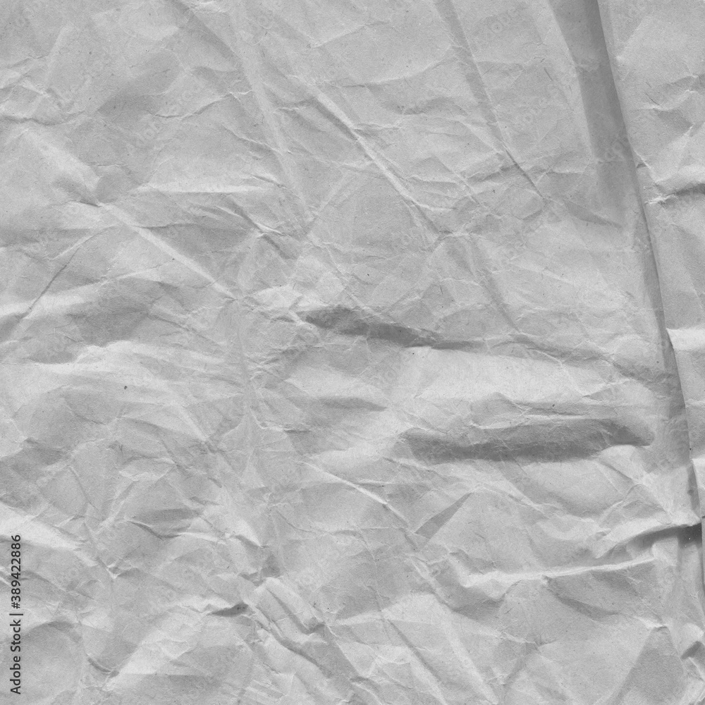 Naklejka premium White vintage and old looking crumpled paper background. Retro cardboard texture. Grunge paper for drawing. Ancient book page. Present wrapping.