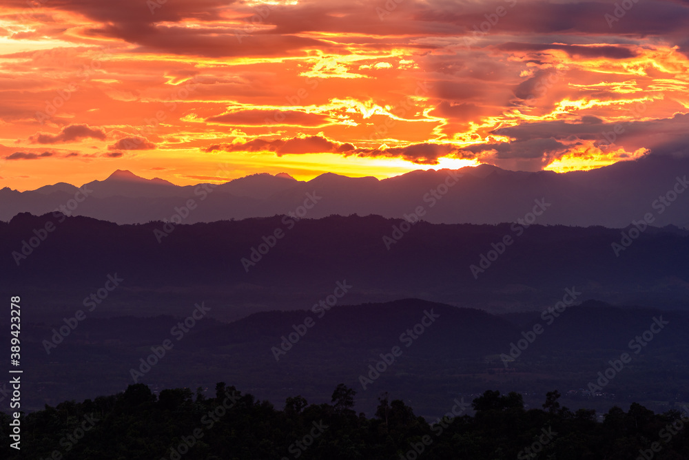 Majestic sunset in the mountains landscape. Dramatic sky. Majestic sunset in the mountains landscape. Dramatic sky.