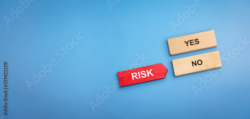 Risk concept with text Yes and No. Risk wooden block pointing No block. Risk Management concept, Risk Management background.