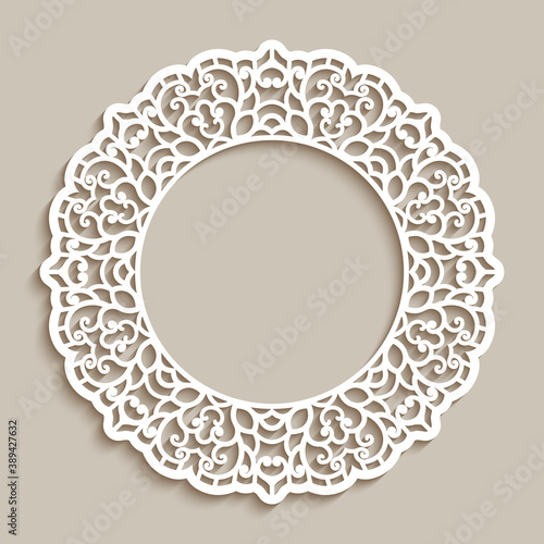 Circle frame with ornamental lace border, cutout paper pattern, elegant template for laser cutting, round lacy decoration for wedding invitation card design. Place for text.