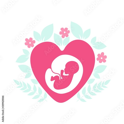 Silhouette of a baby in the womb with flowers