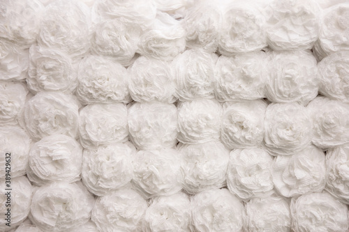 Flowers from white paper napkins. Handmade background
