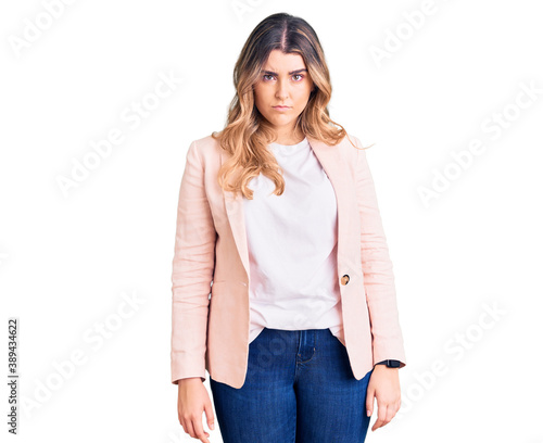 Young caucasian woman wearing business clothes skeptic and nervous, frowning upset because of problem. negative person. © Krakenimages.com