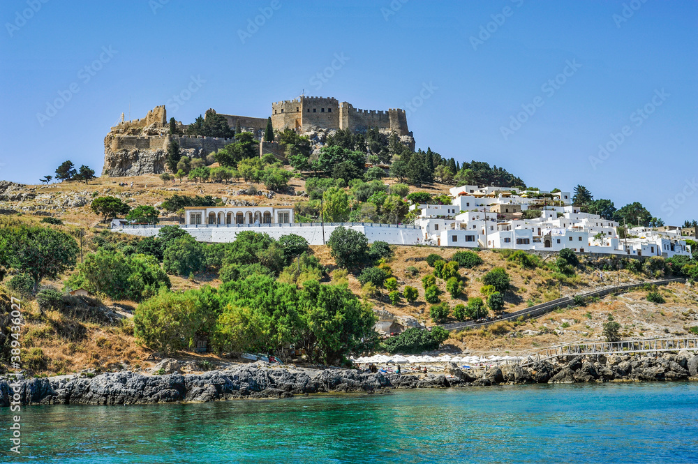 The quarter of the most respectable villas in Lindos is located directly above the harbor on the cliff side of the acropolis of the ancient city of Lind    