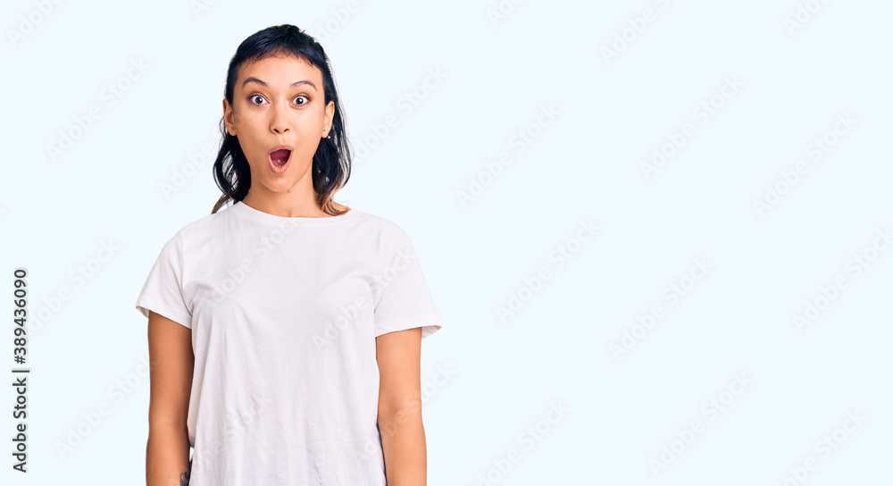 Young woman wearing casual clothes afraid and shocked with surprise expression, fear and excited face. Young woman wearing casual clothes afraid and shocked with surprise expression, fear and excited face.