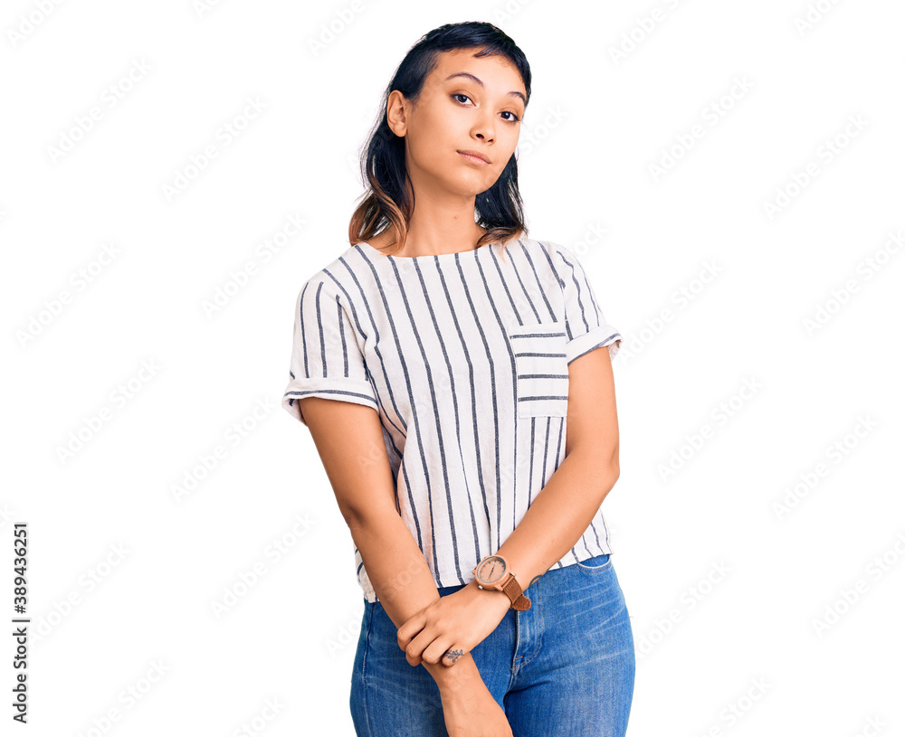 Young woman wearing casual clothes looking sleepy and tired, exhausted for fatigue and hangover, lazy eyes in the morning. Young woman wearing casual clothes looking sleepy and tired, exhausted for fatigue and hangover, lazy eyes in the morning.
