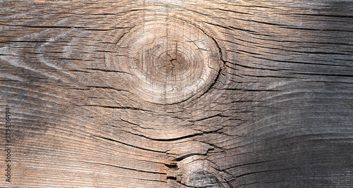 beautiful wooden background with knots and cracks