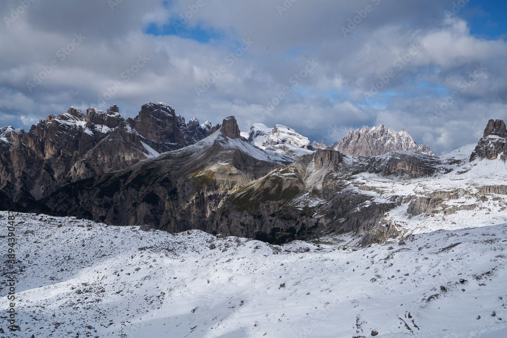 dolomite mountain ridge peaks near 3 zinnen, near three peaks with the first snow in october 2020