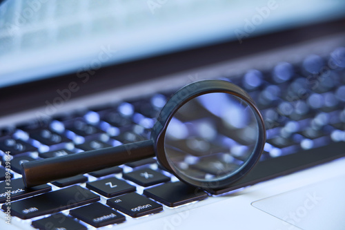 Magnifying Glass on a Laptop