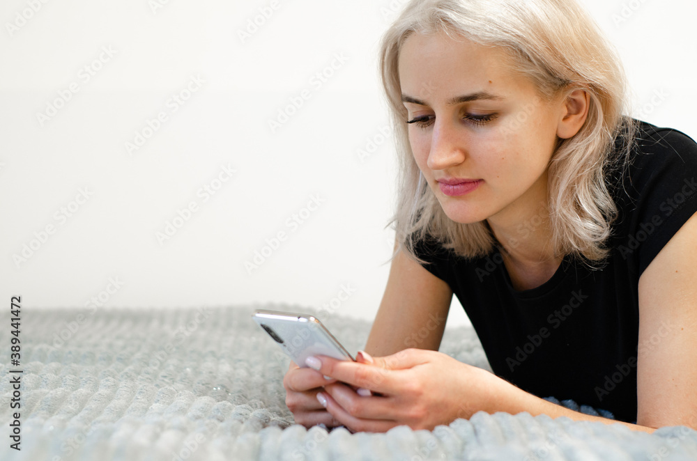 Upset stressed woman holding cellphone disgusted Upset Upset stressed woman holding cellphone disgusted Upset