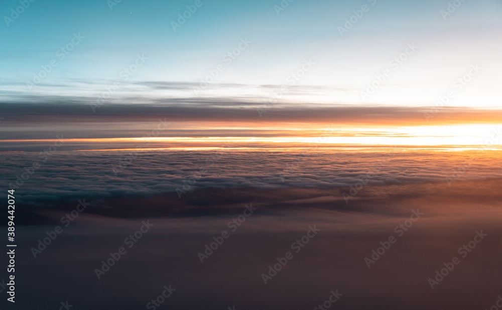 Dramatic background. Beatiful sunset sky above clouds Dramatic background. Beatiful sunset sky above clouds