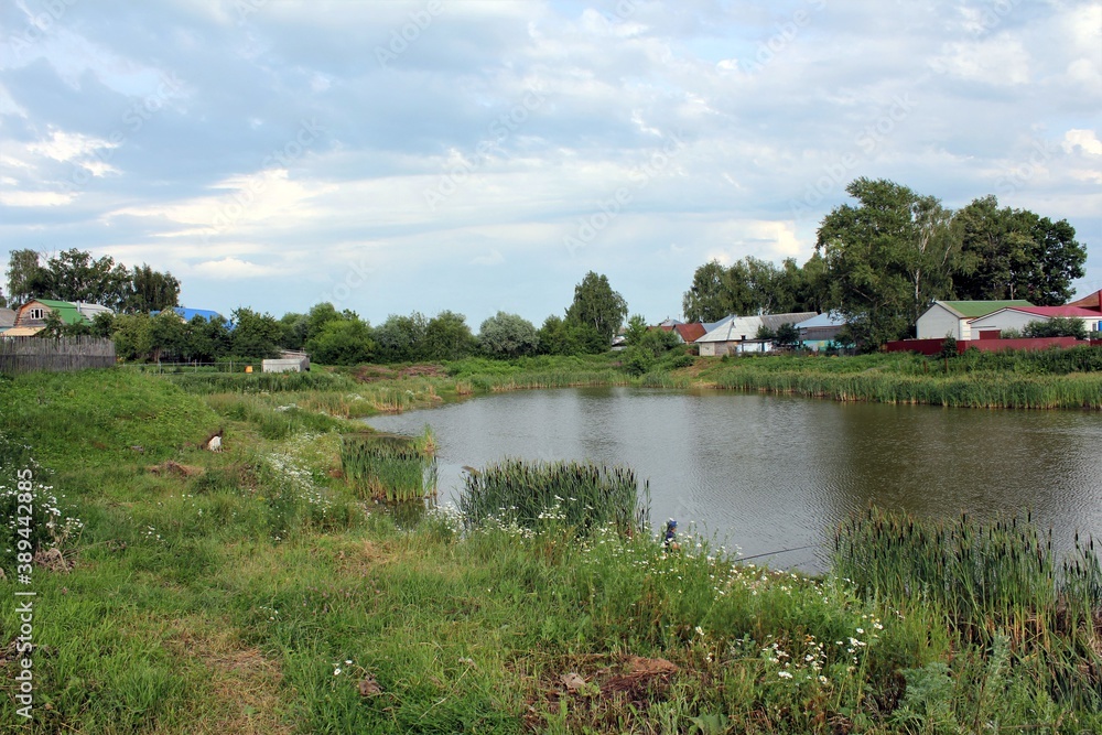 Cloudy summer day at the village Cloudy summer day at the village