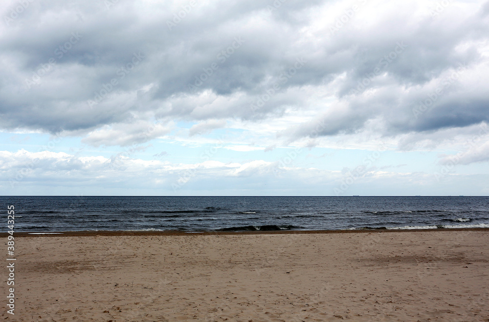Beautiful seascape on a cloudy day. Baltic Sea coast in Latvia.