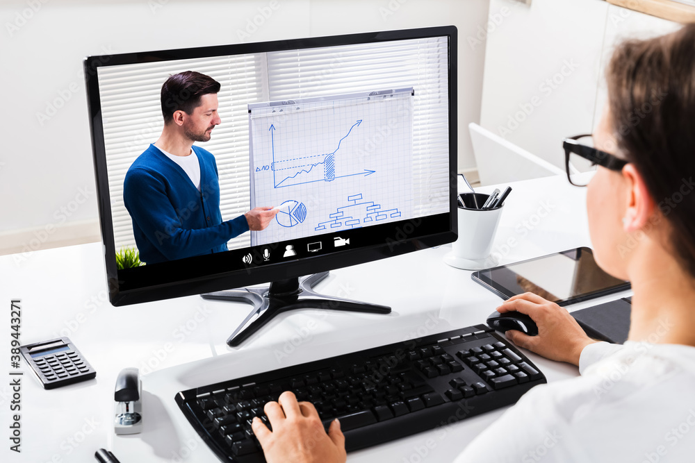 Woman Using The Computer With Invoice Form On Screen Woman Using The Computer With Invoice Form On Screen