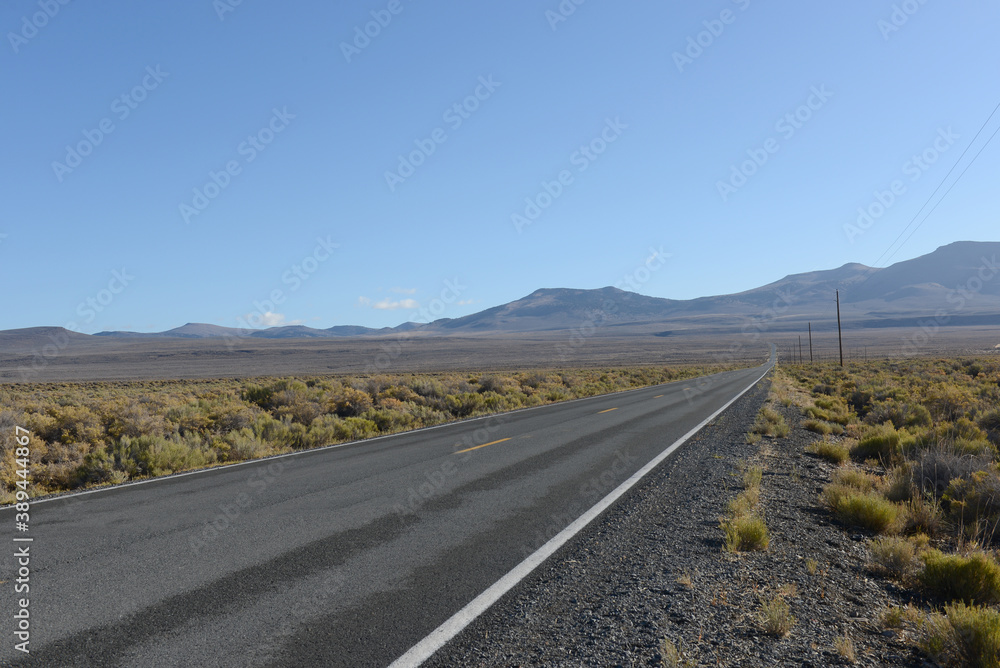 Road across a desert valley 