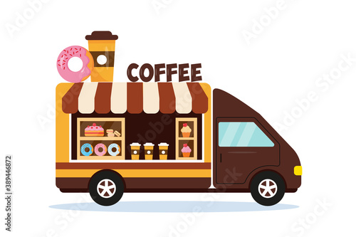 Coffee shop car with sign on the top.