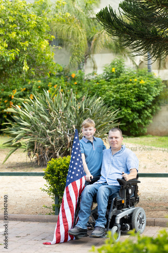 Father and Son with flag of USA