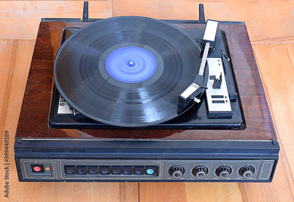 Fototapeta premium Vintage record player with vinyl disc, close-up.