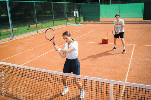 Young couple playing tennis © Andrii 