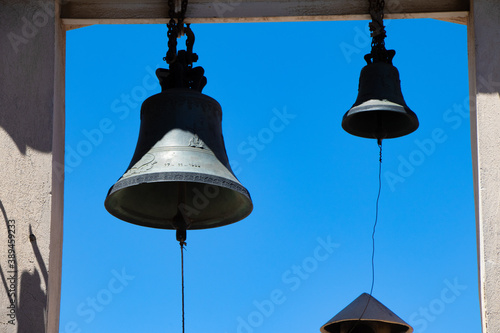 Bells with the sky in background