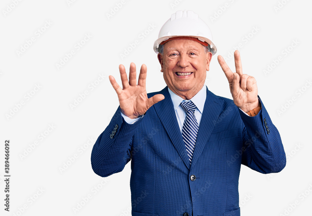 Senior handsome grey-haired man wearing suit and architect hardhat showing and pointing up with fingers number seven while smiling confident and happy. Senior handsome grey-haired man wearing suit and architect hardhat showing and pointing up with fingers number seven while smiling confident and happy.