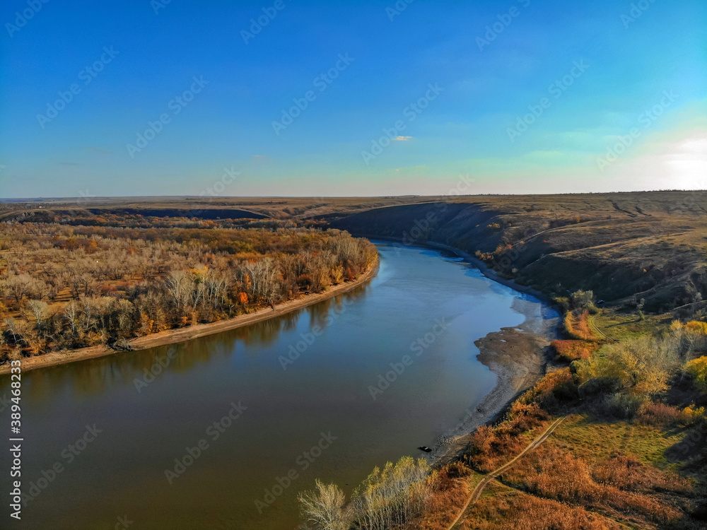 Aerial view of steppe and Seversky Donets in Russia. Beautiful autumn landscape